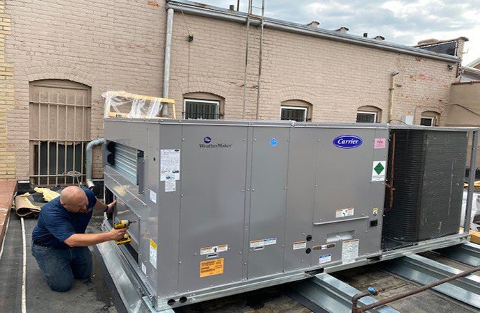https://laredoacplus.com/wp-content/uploads/2025/05/commercial-ac-systems-installation.jpg